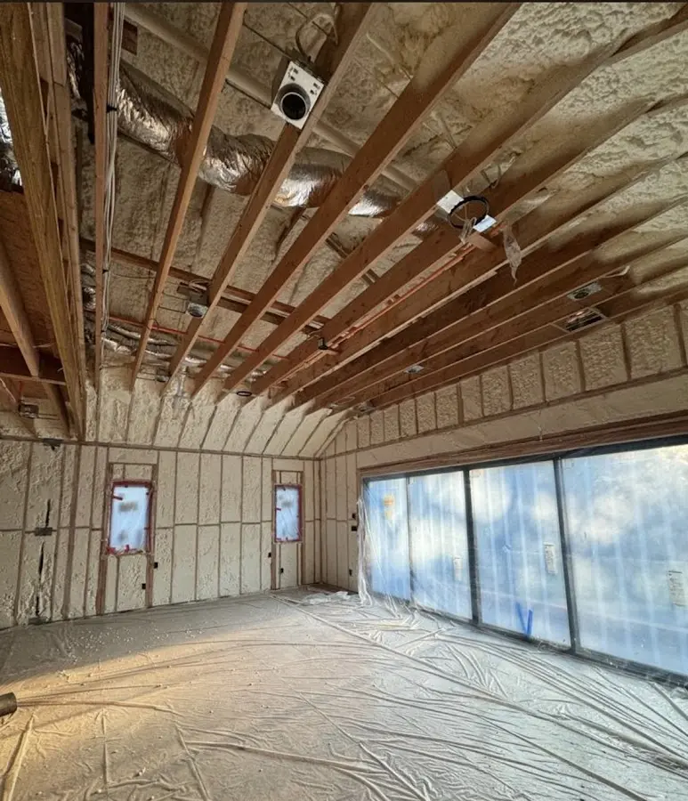 Interior walls and ceiling insulated with spray foam during new construction in Bel Air North